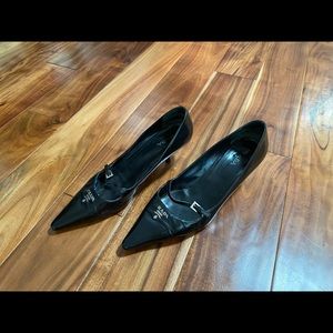 Prada heels.